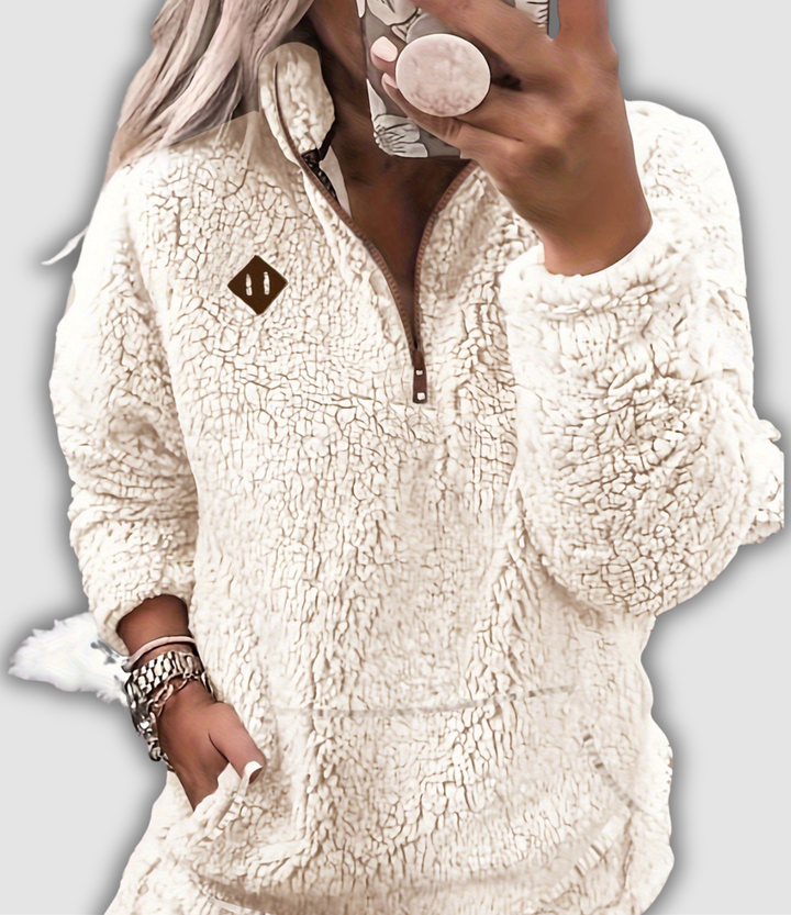 Leokadia - Pullover mit Viertel-Reißverschluss und Aufnähern