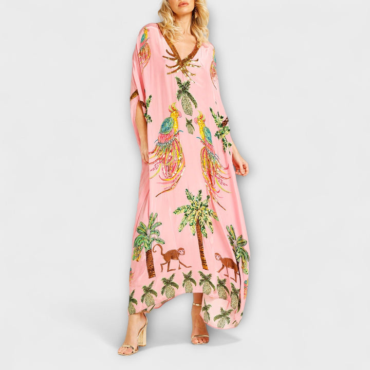 Annika - Auffälliges Kleid mit schrägen Schultern und Kokosbaum-Print