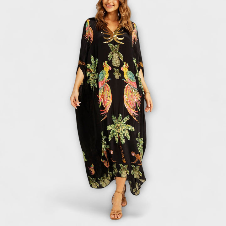 Annika - Auffälliges Kleid mit schrägen Schultern und Kokosbaum-Print