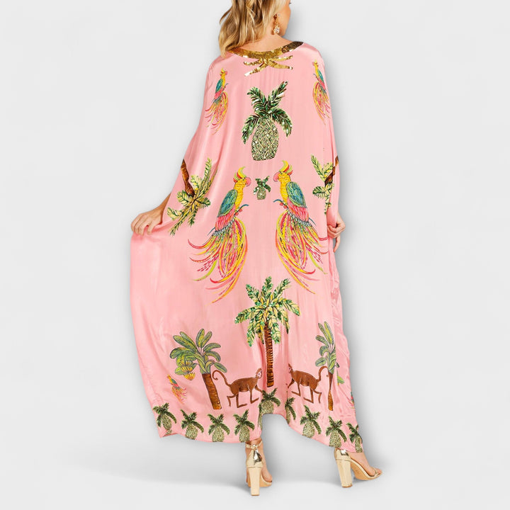 Annika - Auffälliges Kleid mit schrägen Schultern und Kokosbaum-Print