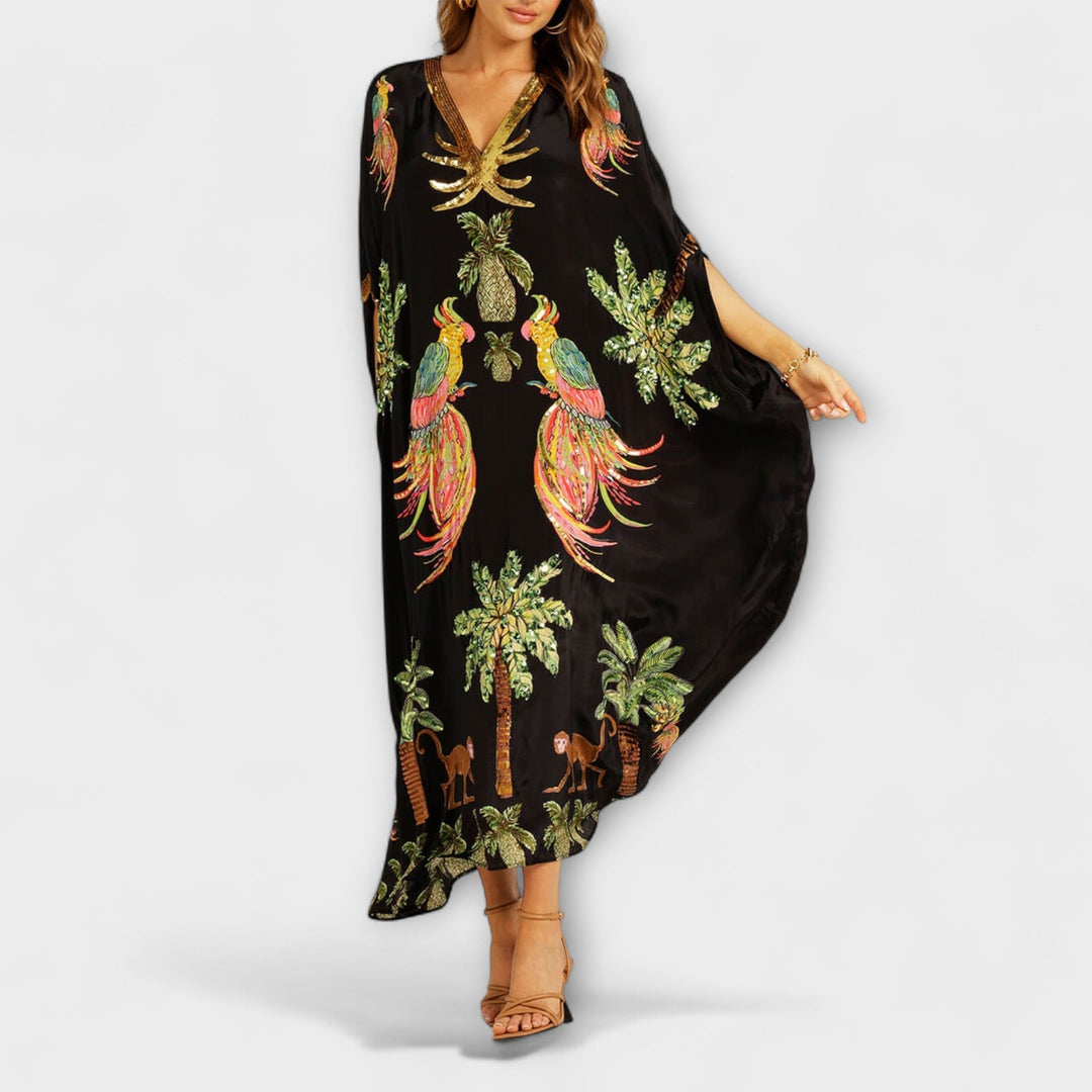 Annika - Auffälliges Kleid mit schrägen Schultern und Kokosbaum-Print