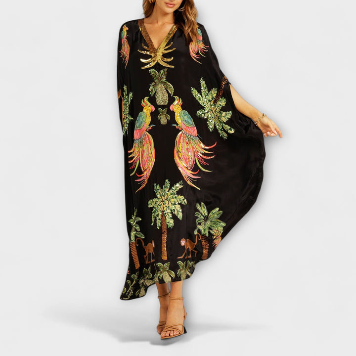 Annika - Auffälliges Kleid mit schrägen Schultern und Kokosbaum-Print