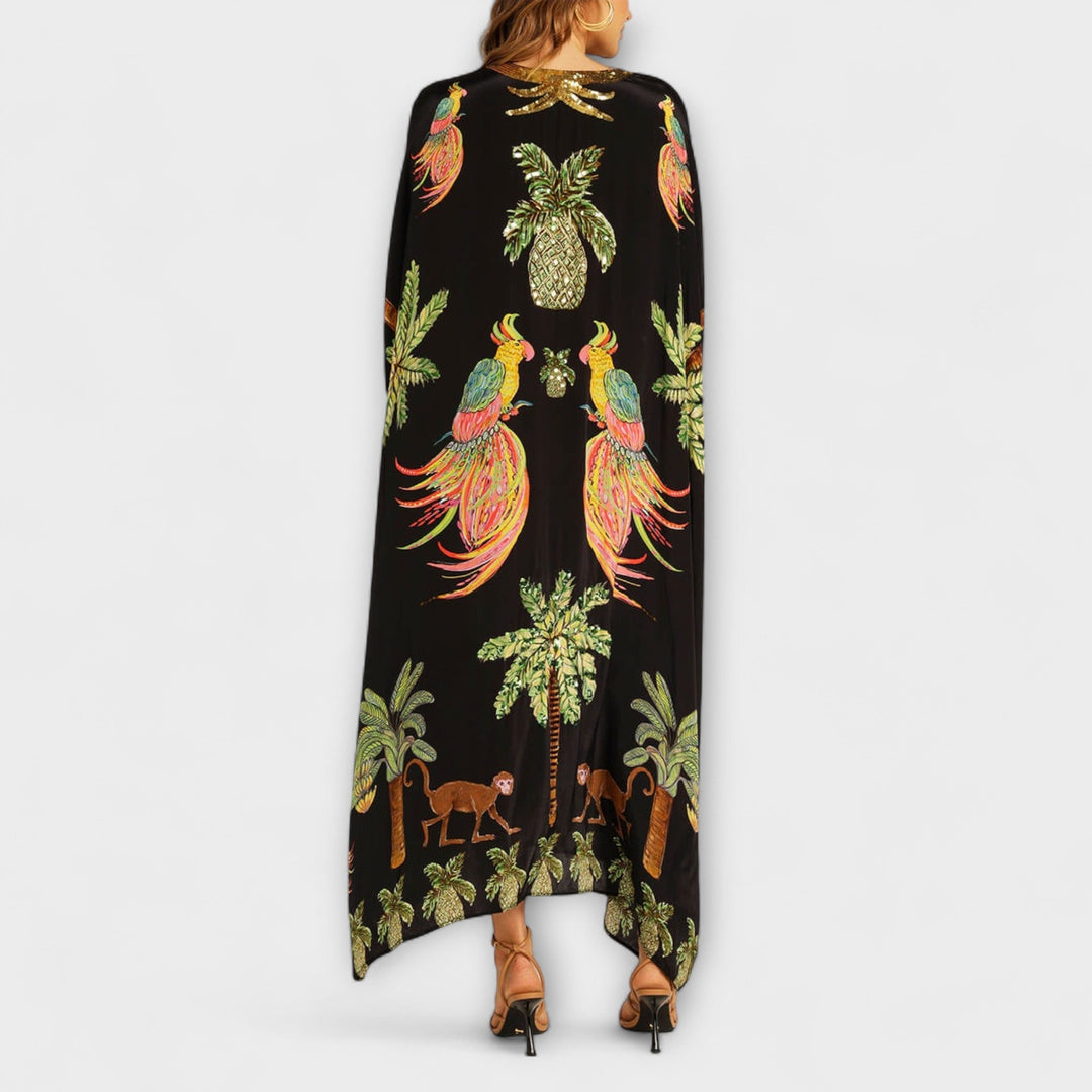 Annika - Auffälliges Kleid mit schrägen Schultern und Kokosbaum-Print