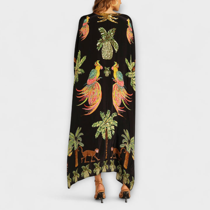 Annika - Auffälliges Kleid mit schrägen Schultern und Kokosbaum-Print